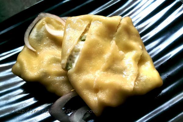 photo of steamed malai momos (steam savoury cream momos)