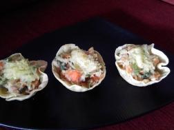 photo of baked tacos with veggi topping
