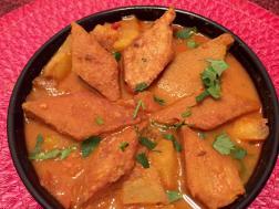 photo of dhokar dalna (fried lentil cakes in bengali curry)