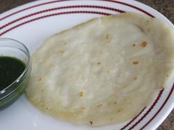 photo of ghaavan (rice flour pancake/dosa)
